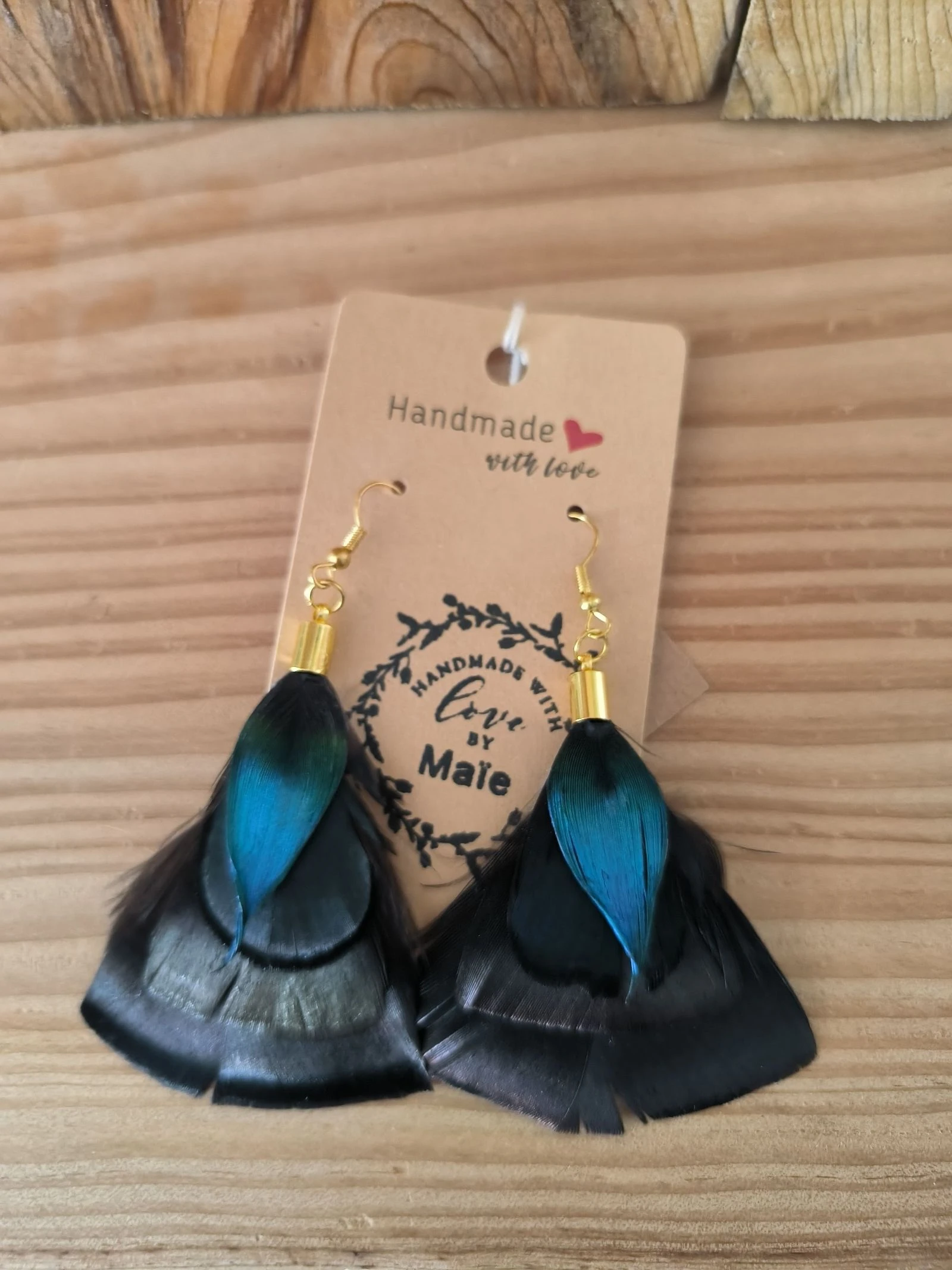 Magnifiques boucles d'oreilles en plumes naturelles